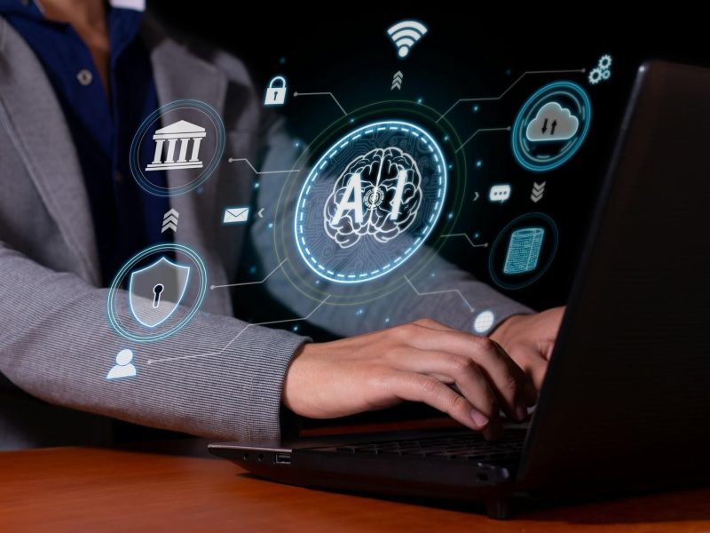 a-man-interacts-with-artificial-intelligence-to-optimize-and-automate-computing-.jpg a-man-interacts-with-artificial-intelligence-to-optimize-and-automate-computing-.jpg